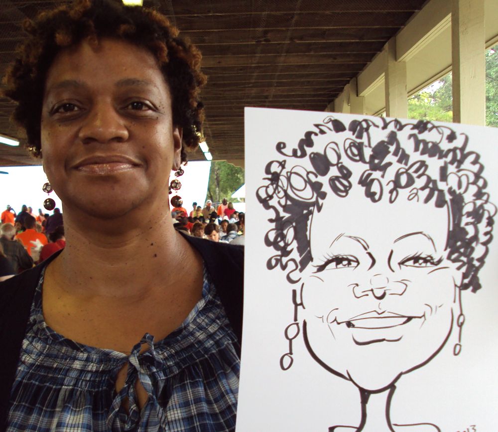 Caricature drawn with pen on paper at an employee picnic in Atlanta.